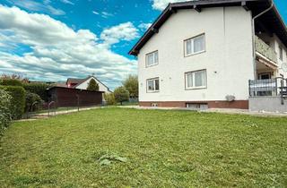 Wohnung kaufen in 63667 Nidda, Große Eigentumswohnung in Zweifamilienhaus, freistehend mit Garten