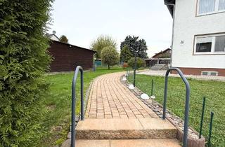 Wohnung kaufen in 63667 Nidda, Große Eigentumswohnung in Zweifamilienhaus, freistehend mit Garten