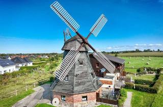 Wohnung kaufen in 18225 Kühlungsborn, Stilvolle Küstenferien mit herrlichem Grünblick - in historischer "Brunshöver Möhl"