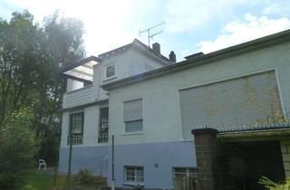 Mehrfamilienhaus kaufen in 63589 Linsengericht, Altenhasslau: Mehrfamilienhaus mit drei Wohnungen, ausgebautem Untergeschoss und großem Grundstück..