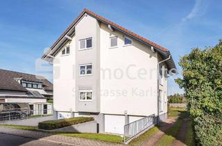 Wohnung kaufen in 76689 Karlsdorf-Neuthard, Vermietete Eigentumswohnung im Souterrain mit 2 Terrassen - Sichere Rendite für kluge Anleger