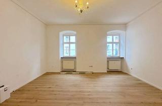 Wohnung kaufen in 68526 Ladenburg, Charmante Altbauwohnung im Zentrum der Ladenburger Altstadt