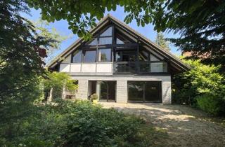 Haus kaufen in 31700 Heuerßen, Großzügiges Architektenhaus am Waldrand mit professionell angelegtem Garten - Heuerßen