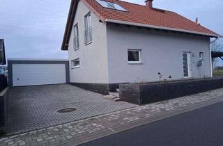 Einfamilienhaus kaufen in 66871 Haschbach, Freistehendes Einfamilienhaus mit Doppelgarage, Carport, Garten und Wiesengrundstück