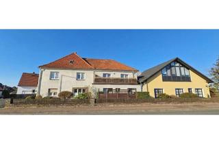 Doppelhaushälfte kaufen in 31311 Uetze, Uetze - Renditeimmobilie - 4-Familienhaus + Doppelhaushälfte + 3 Garagen