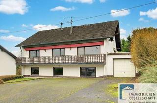 Haus kaufen in 57614 Niederwambach, Großzügiges Zweifamilienhaus mit separater Garage in ruhiger Ortsrandlage!