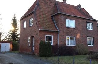 Doppelhaushälfte kaufen in 24768 Rendsburg, Zwei Wohneinheiten und viel Potential