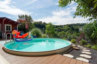 Haus kaufen in 54655 Kyllburg, Gepflegter Bungalow mit herrlichem Weitblick, großem Grundstück und Wellness-Oase