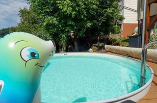 Haus kaufen in 54655 Kyllburg, Gepflegter Bungalow mit herrlichem Weitblick, großem Grundstück und Wellness-Oase