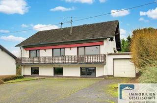 Haus kaufen in 57614 Niederwambach, Großzügiges Zweifamilienhaus mit separater Garage in ruhiger Ortsrandlage!