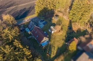 Haus kaufen in 82194 Gröbenzell, Gröbenzell - Zweifamilienhaus in idyllischer Lage zu verkaufen