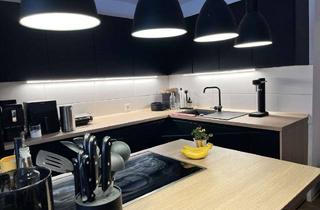 Wohnung kaufen in 47441 Moers, Moderne 3-Zimmerwohnung mit Balkon und zwei Tiefgaragenplätzen in der Moerser City