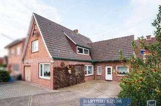 Einfamilienhaus kaufen in 21737 Wischhafen, Solides Einfamilienhaus mit Anbau und Garage in zentraler Lage
