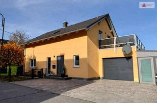 Einfamilienhaus kaufen in 09471 Königswalde, Einfamilienhaus mit Wintergarten, Terrasse, Garage & Erdwärme in Königswalde bei Annaberg & Chemnitz