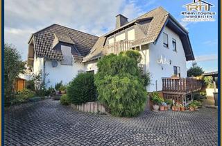 Einfamilienhaus kaufen in 65558 Gückingen, Großzügiges Wohnen mit Perspektive – Einfamilienhaus mit ELW in ruhiger Lage von Gückingen!