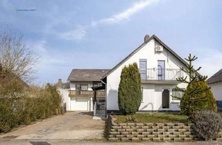 Haus kaufen in 54439 Palzem, Zwei Einfamilienhäuser mit Balkonen, Terrassen, Garten inklusive Teich, Garagen und Stellplätze