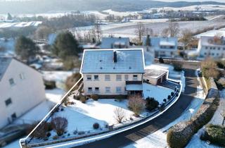 Haus kaufen in 90619 Trautskirchen, Vollunterkellertes Zweifamilienhaus mit großem Garten & 2 Garagen in Trautskirchen
