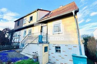 Doppelhaushälfte kaufen in 34317 Habichtswald, Schöne Doppelhaushälfte mit Nebengebäude, Garage und angelegtem Gartenbereich