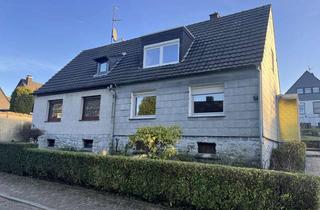 Doppelhaushälfte kaufen in 42579 Heiligenhaus, Entwicklungsfähige Doppelhaushälfte auf großem Grundstück in ruhiger, grüner und gefragter Lage