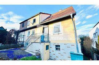 Doppelhaushälfte kaufen in 34317 Habichtswald, Schöne Doppelhaushälfte mit Nebengebäude, Garage und angelegtem Gartenbereich