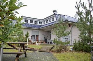 Einfamilienhaus kaufen in Dachsring 38, 38557 Osloß, Großzügiges, freistehendes Einfamilienhaus mit Galerie, Sauna, Kamin & unverbautem Blick