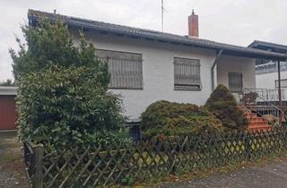 Haus kaufen in 64832 Babenhausen, Babenhausen - Bungalow im Landhausstil mit Pool und Einliegerwohnung