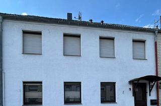 Reihenhaus kaufen in 41363 Jüchen, Jüchen - Zweifamilien-Reihenhaus im guten Zustand mit vielen Möglichkeiten