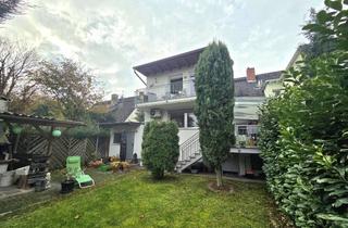 Doppelhaushälfte kaufen in 55122 Gonsenheim, Große Doppelhaushälfte mit freistehendem Anbau und Einliegerwohnung in TOP-Lage
