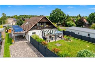 Einfamilienhaus kaufen in 27624 Drangstedt, Modernisiertes Einfamilienhaus mit großem Garten, Balkon und Garage