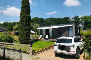 Haus kaufen in 27711 Osterholz-Scharmbeck, Osterholz-Scharmbeck - Ein Haus am See + Tretboot Verleih