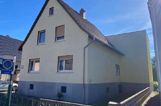 Haus kaufen in 35321 Laubach, Laubach - Zweifamilienhaus mit großem Garten, Garage & Ausbaupotenzial