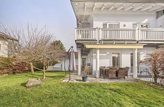 Wohnung kaufen in 83125 Eggstätt, Exklusive Wohnung auf drei Etagen mit Bergblick und eigenem Garten