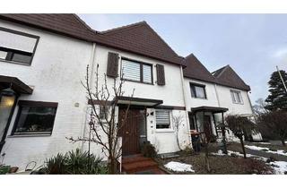 Reihenhaus kaufen in 24558 Henstedt-Ulzburg, Mittelreihenhaus mit Wintergarten und Garage