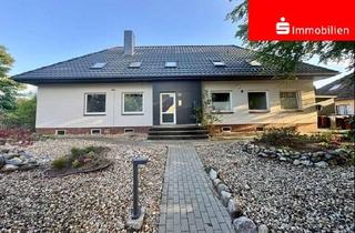 Mehrfamilienhaus kaufen in 25551 Hohenlockstedt, Umfangreich saniertes Mehrfamilienhaus mit 4 Wohungen + Garagen - vermietet