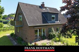 Einfamilienhaus kaufen in 24628 Hartenholm, Teilvermietetes Einfamilienhaus mit Einliegerwohnung in schöner Lage von Hartenholm