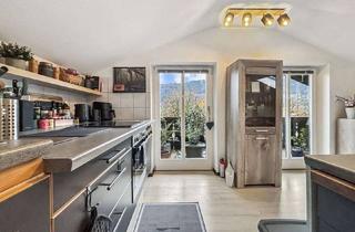 Wohnung kaufen in 82467 Garmisch-Partenkirchen, Garmisch-Partenkirchen - Vermietete 2-Zimmer-Dachgeschosswohnung mit Zugspitzblick