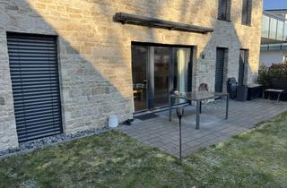 Wohnung kaufen in 31515 Wunstorf, Exklusive 3-Zimmer-Eigentumswohnung mit Privatgarten – Wohnen in Bestlage am Steinhuder Meer