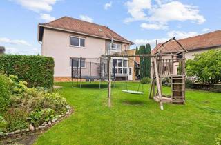 Haus kaufen in 61169 Friedberg, Wohnkomfort, Flexibilität und solide Vermietung – vielseitiges Zweifamilienhaus in Ockstadt