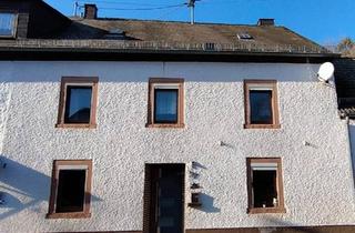 Doppelhaushälfte kaufen in 54576 Hillesheim, Hillesheim - Haus mit Potenzial für Sanierungsprofis