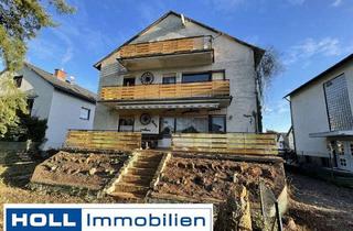 Wohnung kaufen in 63165 Mühlheim, ** Achtung Handwerker **Ein Haus im Haus mit Terrasse, Garten und Garage