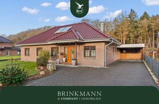 Haus kaufen in 27616 Beverstedt, Beverstedt - Moderner Winkelbungalow in ländlicher Lage mit Außbaupotenzial