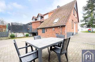 Doppelhaushälfte kaufen in 24250 Warnau, Familienfreundliche Doppelhaushälfte mit Garten und Wohlfühlcharakter!