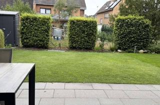 Wohnung kaufen in Kronenpützchen, 41542 Dormagen, Wohnen wie im eigenen Haus: Exklusive EG-Wohnung mit Garten