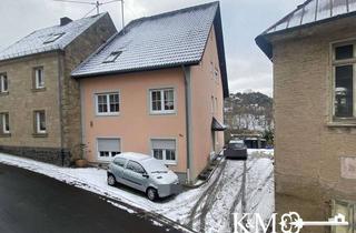 Haus kaufen in 56745 Volkesfeld, Solide Kapitalanlage: Drei vermietete Wohnungen mit Stellplätzen
