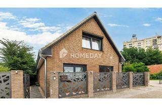 Einfamilienhaus kaufen in 27753 Delmenhorst, Delmenhorst - Einfamilienhaus mit zwei Wohneinheiten und großem Grundstück mit Baulandreserve