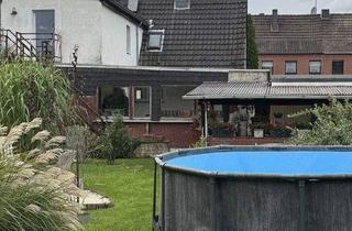 Doppelhaushälfte kaufen in 47443 Moers, Moers - Doppelhaushälfte in Moers-Scherpenberg mit großem Garten