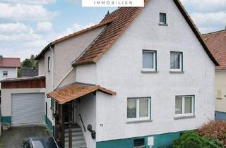 Wohnung kaufen in 35581 Wetzlar, Wetzlar / Münchholzhausen - Großzügige Wohnung mit Garten und XXL Garage - provisionsfrei