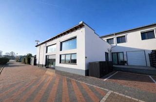 Wohnung kaufen in 64839 Münster, Exklusives Wohnen mit Hauscharakter – sanierte Wohnung in ruhiger Feldrandlage von Münster!