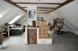 Wohnung kaufen in 76744 Wörth, Großzügige, vermietete 2,5-Zimmer-Dachgeschoss-ETW in Wörth am Rhein