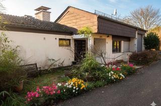 Einfamilienhaus kaufen in 97846 Partenstein, Wohnen im Wald-Panorama: Lichtdurchflutetes Architekten-Juwel in Partenstein